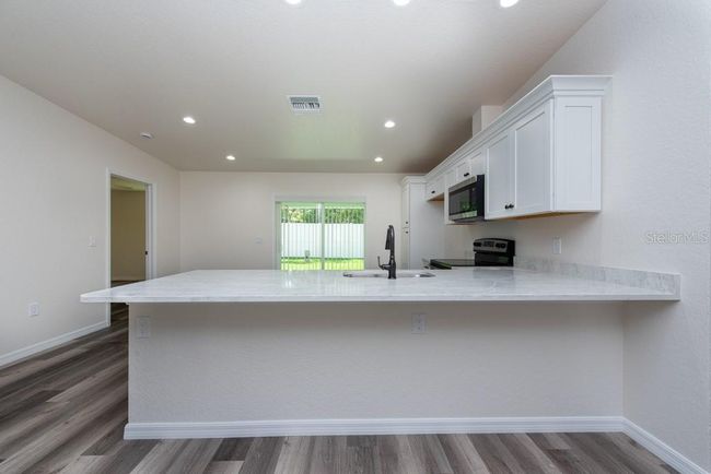 7230 Apache Trl, House other with 4 bedrooms, 2 bathrooms and null parking in SPRING HILL FL | Image 8