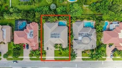 10690 Versailles Boulevard, House other with 4 bedrooms, 3 bathrooms and null parking in Wellington FL | Image 3