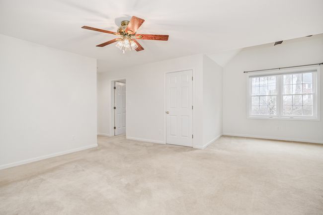 Primary bedroom with lovely sitting area. | Image 19