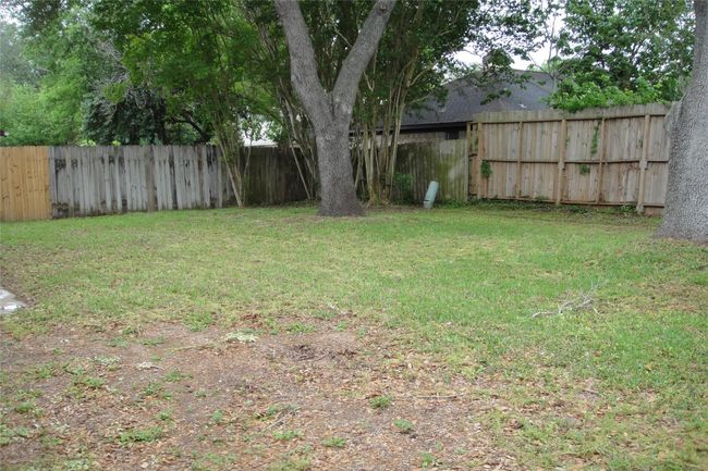 Large back yard. Plenty of room for a pool or a large garden! | Image 7
