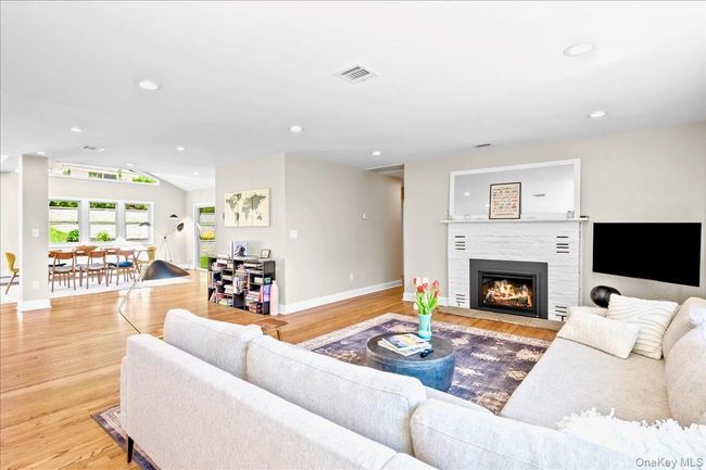 Living room with lofted ceiling, and recessed lighting | Image 10