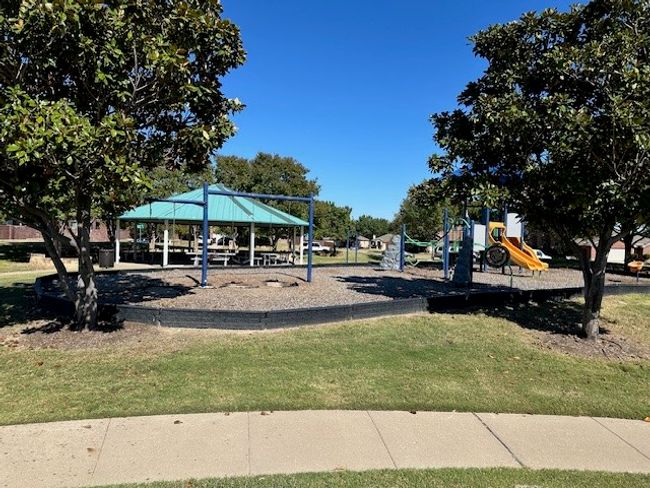 Community playground with a gazebo and a lawn | Image 18