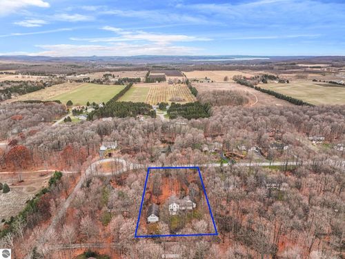 9685 Woodys Run, Traverse City, MI, 49684-7909 | Card Image