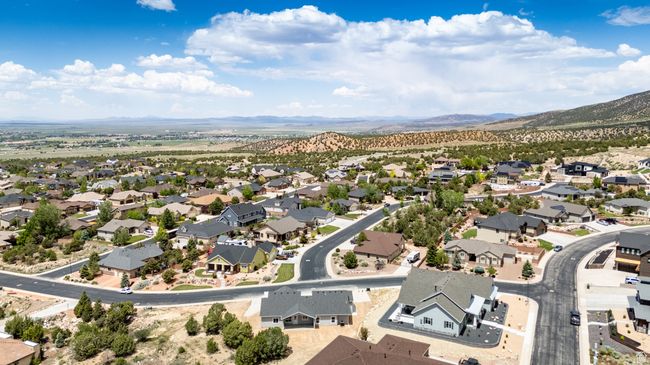 Aerial view of residential area featuring a mountain backdrop | Image 62