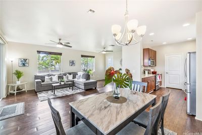 Main living room, dining area and kitchen where everyone can enjoy together. | Image 2