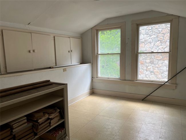 Upstairs 4th bedroom with tons of storage, too. Great natural light. | Image 10