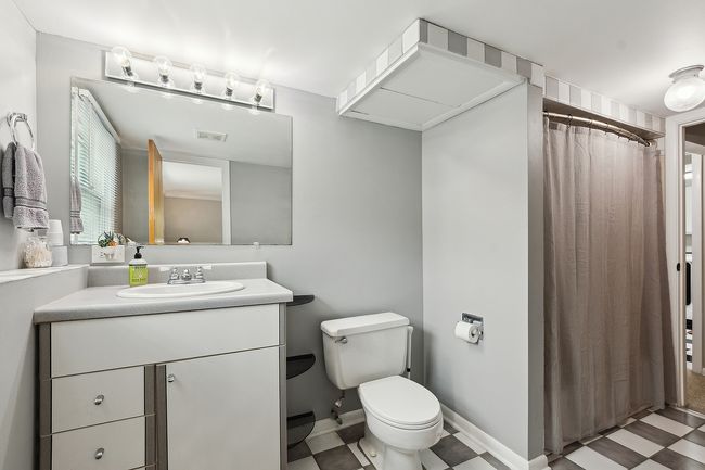 Lower level bath with access from hallway and bedr | Image 33