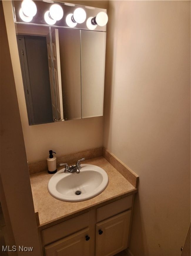 Back Bedroom's Full Bathroom showing vanity | Image 32