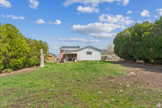 View of yard with fence | Image 28