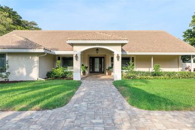 Covered Entry and porch allow for lazy summers and lovely afternoons! | Image 3