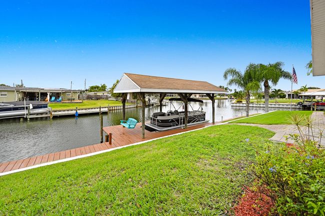 Coverered Boat dock and lift, with room to expand. | Image 4