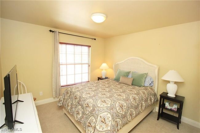 View of carpeted bedroom | Image 13