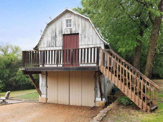 Another view of the garage and loft area | Image 13