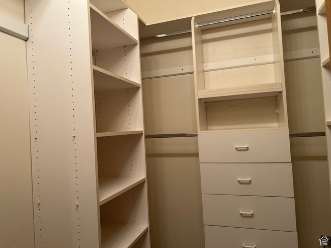 Two of two walk-in closets, primary bedroom | Image 20