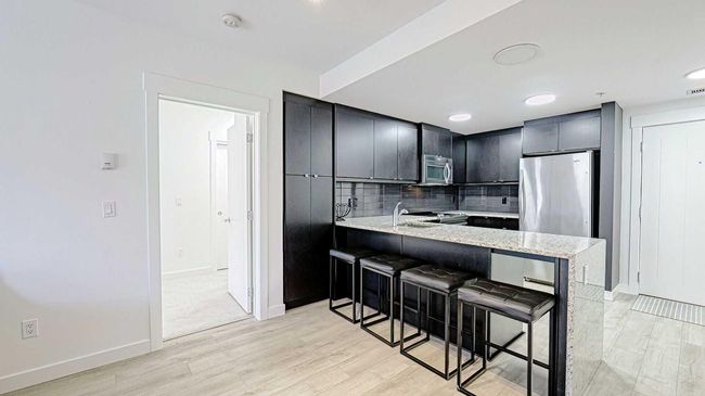 122 - 15 Aspenmont Hts Sw, Condo with 2 bedrooms, 2 bathrooms and 1 parking in Calgary AB | Image 5