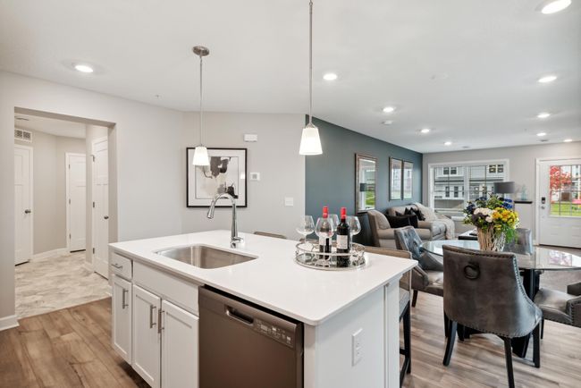 Desirably located center island that faces the dining and great room. Great for hosting and entertaining! *Photos are of another model, colors and finishes may vary. | Image 6