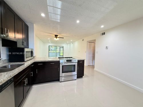 103-6095 N Sabal Palm Blvd, Tamarac, FL, 33319-2626 | Card Image