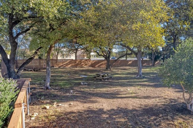 The gated community offers common areas and a dog park! | Image 29