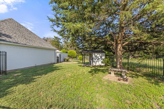 View of fenced yard | Image 36