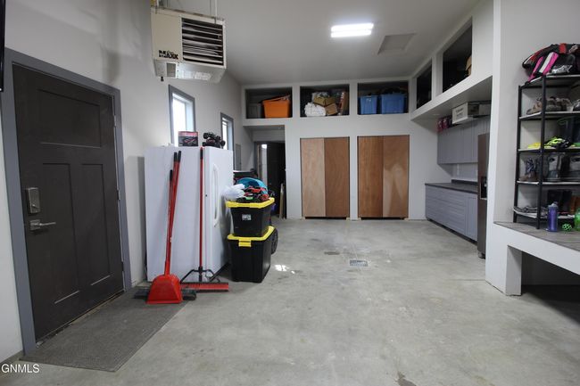 tandem leading to door to back shop area | Image 32