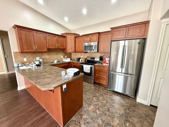 304 Sunvale Cres Ne, Townhouse with 2 bedrooms, 1 bathrooms and 2 parking in High River AB | Image 11