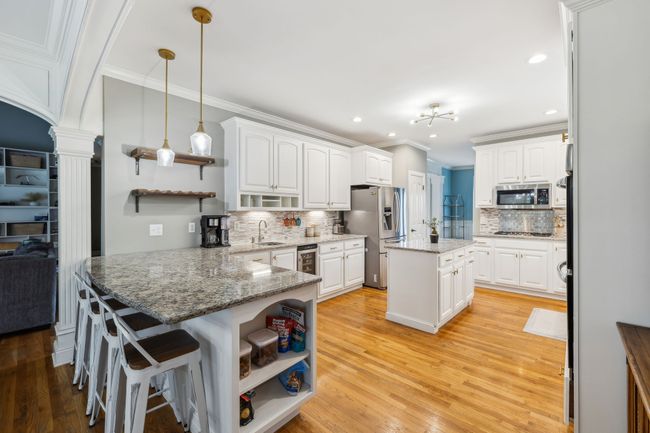 The bar is the perfect place for family and friends to hang out and share their day. | Image 17