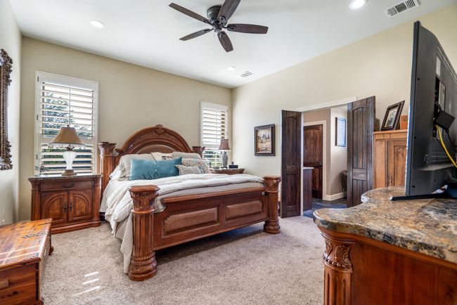 Carpeted bedroom with recessed lighting and ceiling fan | Image 19