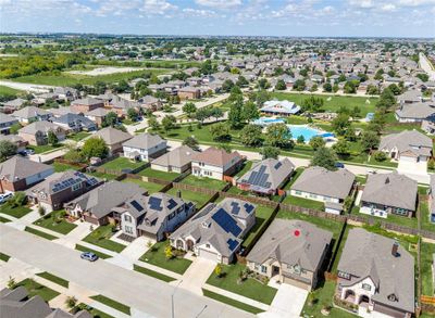 Drone/aerial view walking distance from the community club house, pool, splash pool and playground | Image 3