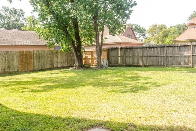 Oversized backyard is fully fenced. | Image 17