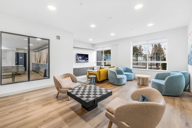 Living area featuring visible vents, recessed lighting, and wood finished floors | Image 23