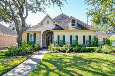 Beautiful custom home located in the beautiful community of Falcon Point. | Image 1