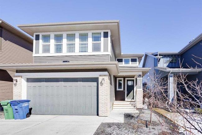 202 Reunion Green Nw, Home with 6 bedrooms, 3 bathrooms and 4 parking in Airdrie AB | Image 1