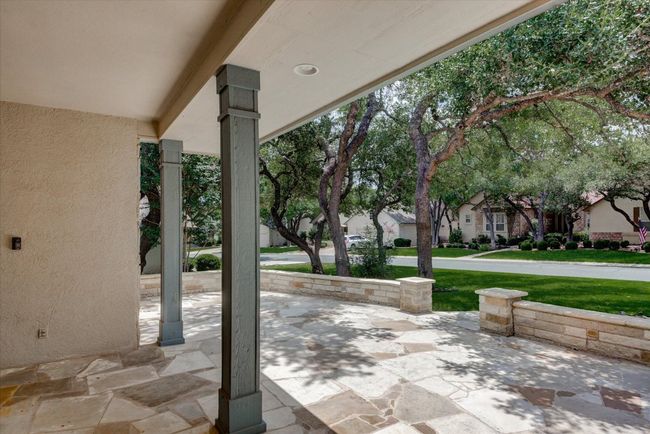 View of patio with a residential view | Image 4