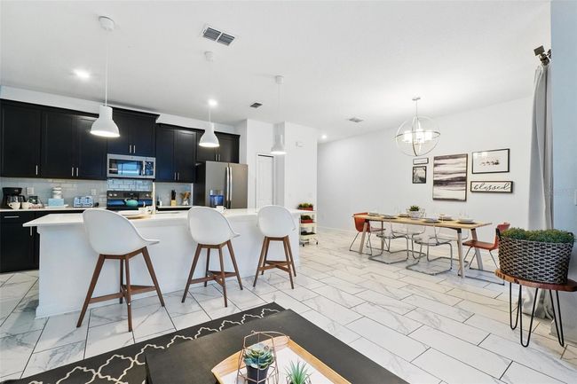 1570 Sandbagger Dr, Townhouse with 4 bedrooms, 3 bathrooms and null parking in DAVENPORT FL | Image 13