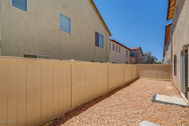 View of yard featuring a fenced backyard | Image 26