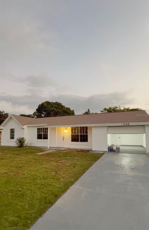 1048 Newbern St Ne, Palm Bay, FL, 32905-4428 | Card Image