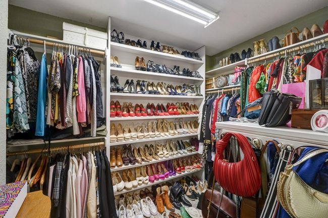 View of walk in closet | Image 26