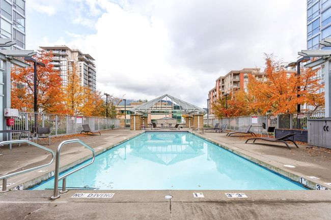 Pool featuring fence and a patio | Image 22