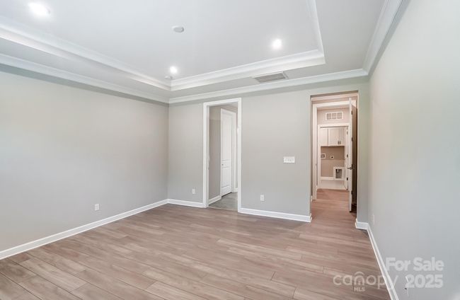 Primary Bedroom with View of Closet and Bathroom-Photo similar to Subject Property | Image 18