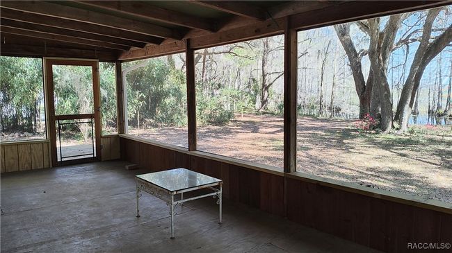 Watch the sun and moon rise over the lake from this 10 x 24 screen porch. | Image 5