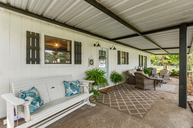 Are you a rocking chair lover or would you prefer to look out over your beautiful new property in a comfortable outdoor couch? | Image 33