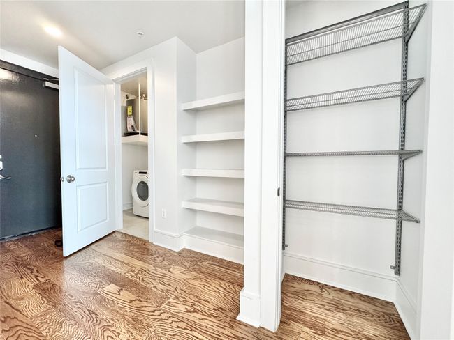Closet with washer / clothes dryer | Image 25