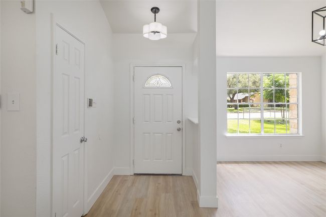 Welcoming entrance bathed in natural light. | Image 5