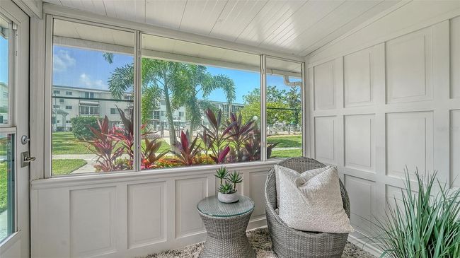 View of cozy lanai. | Image 8
