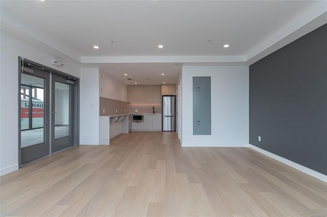 Gym with plenty of natural light, baseboards, and recessed lighting | Image 28