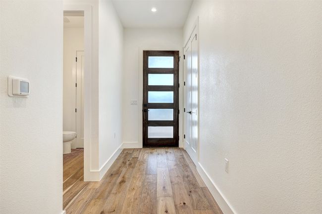 Entrance foyer featuring light wood-style floors and baseboards | Image 4