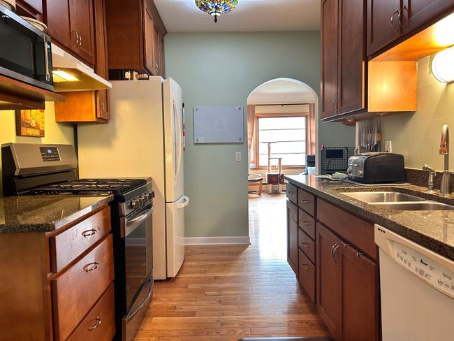 Arched doorway gives this space such character! | Image 33