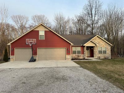 9335 Folkert Road, Home with 3 bedrooms, 3 bathrooms and null parking in Clay Twp MI | Image 1