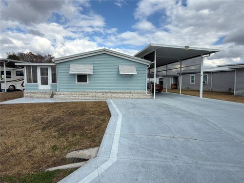 4992 Shore Line Dr, POLK CITY, FL, 33868-9305 | Card Image