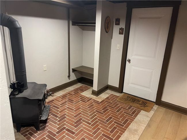 wood burning stove in game room | Image 33